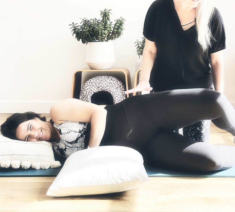 Pregnant woman in a 121 Pilates class. 